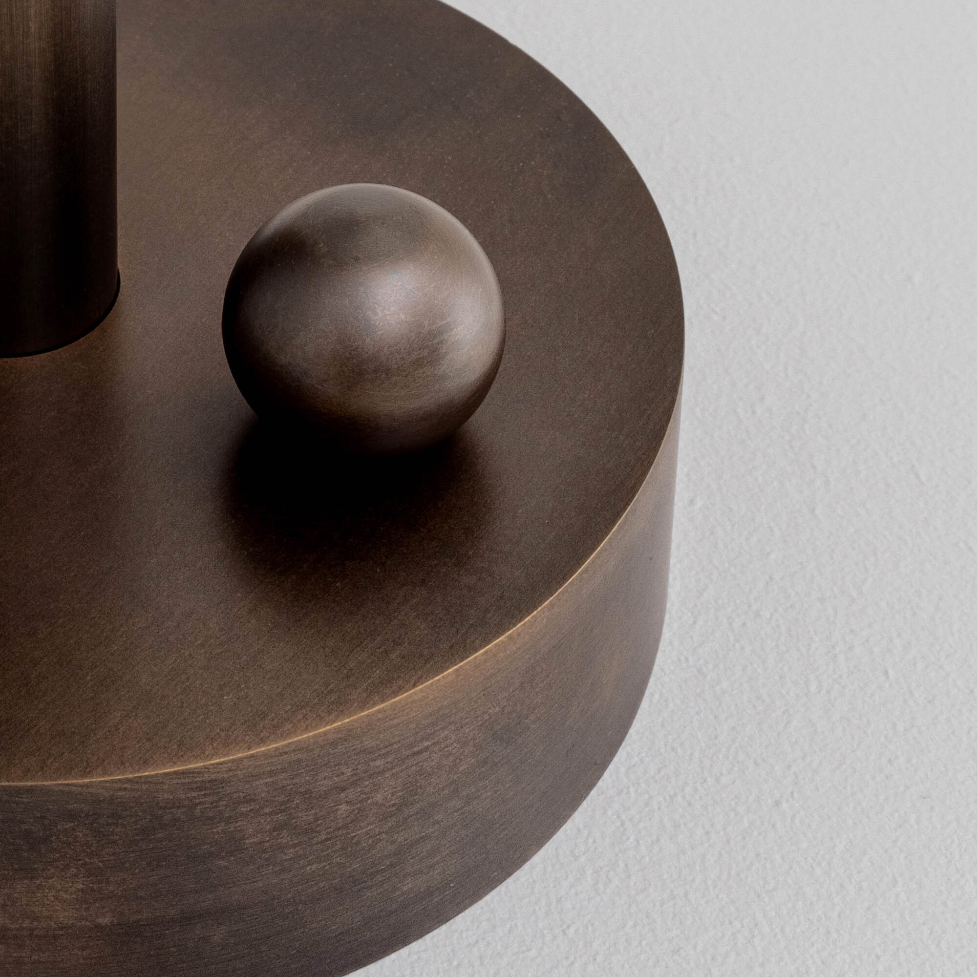 Close-up of brass elemnts in Vesta Table