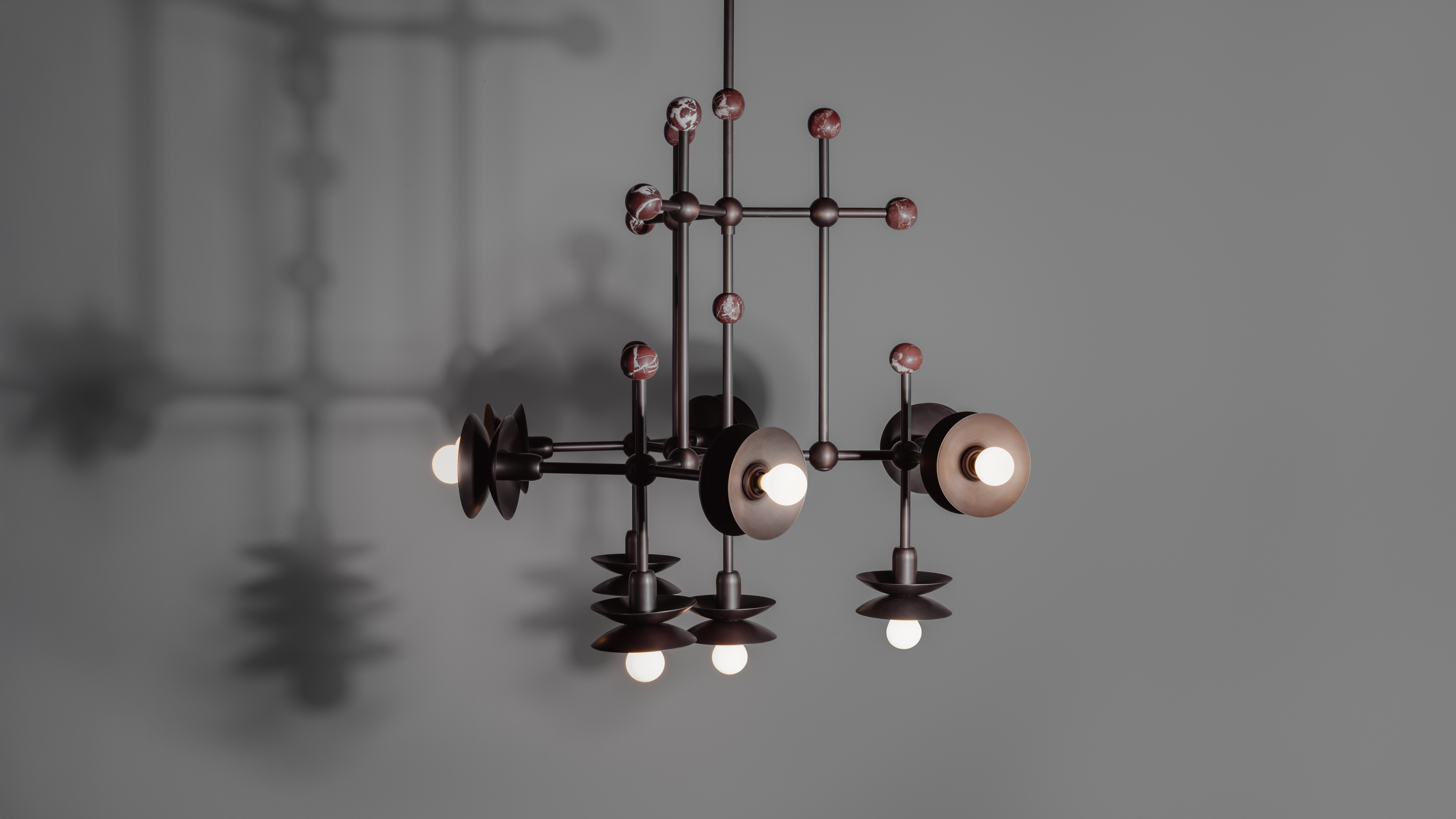 Babylon brass and marble Chandelier in classic bronze finish handcrafted by Schwung