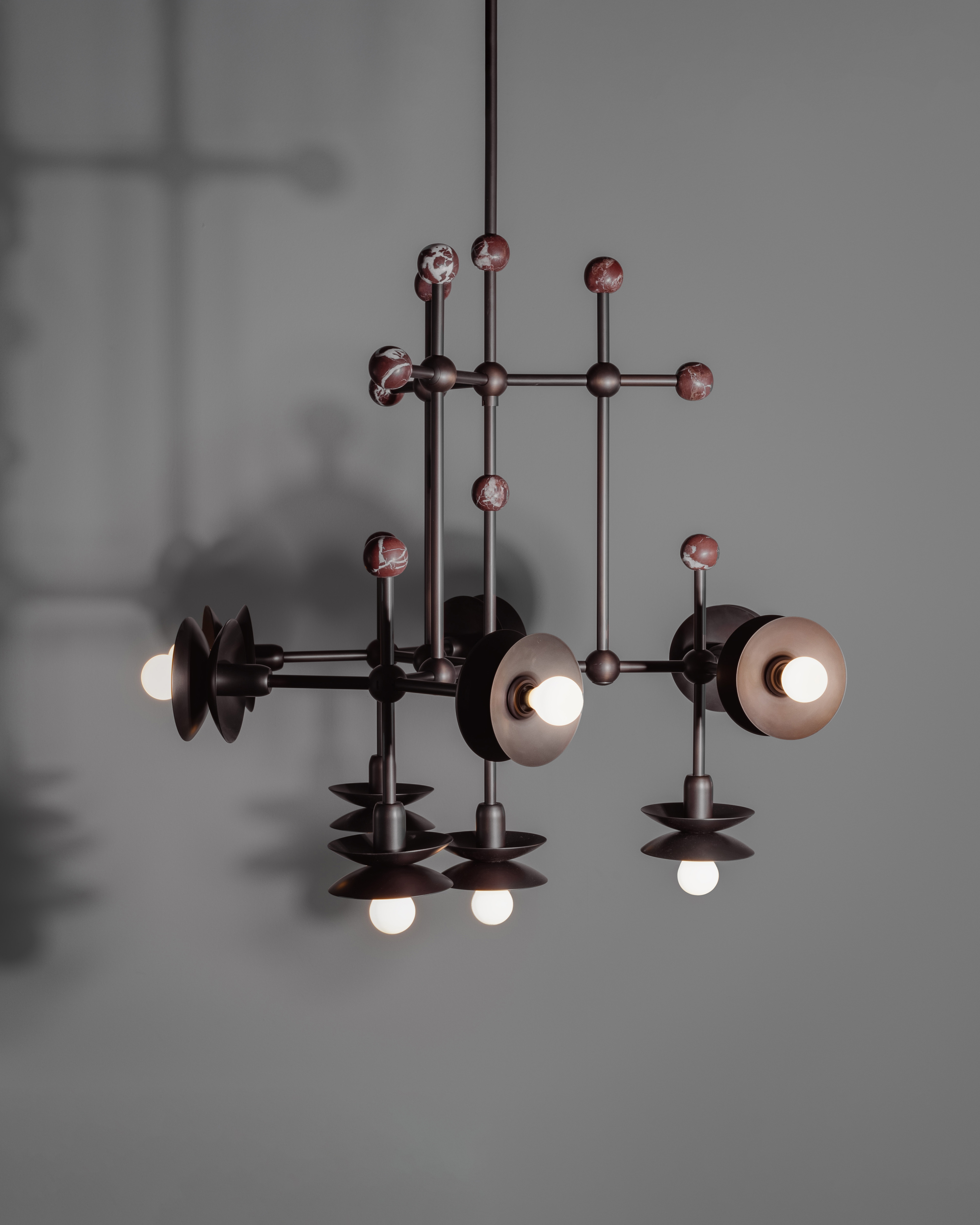 Babylon brass and marble Chandelier in classic bronze finish handcrafted by Schwung