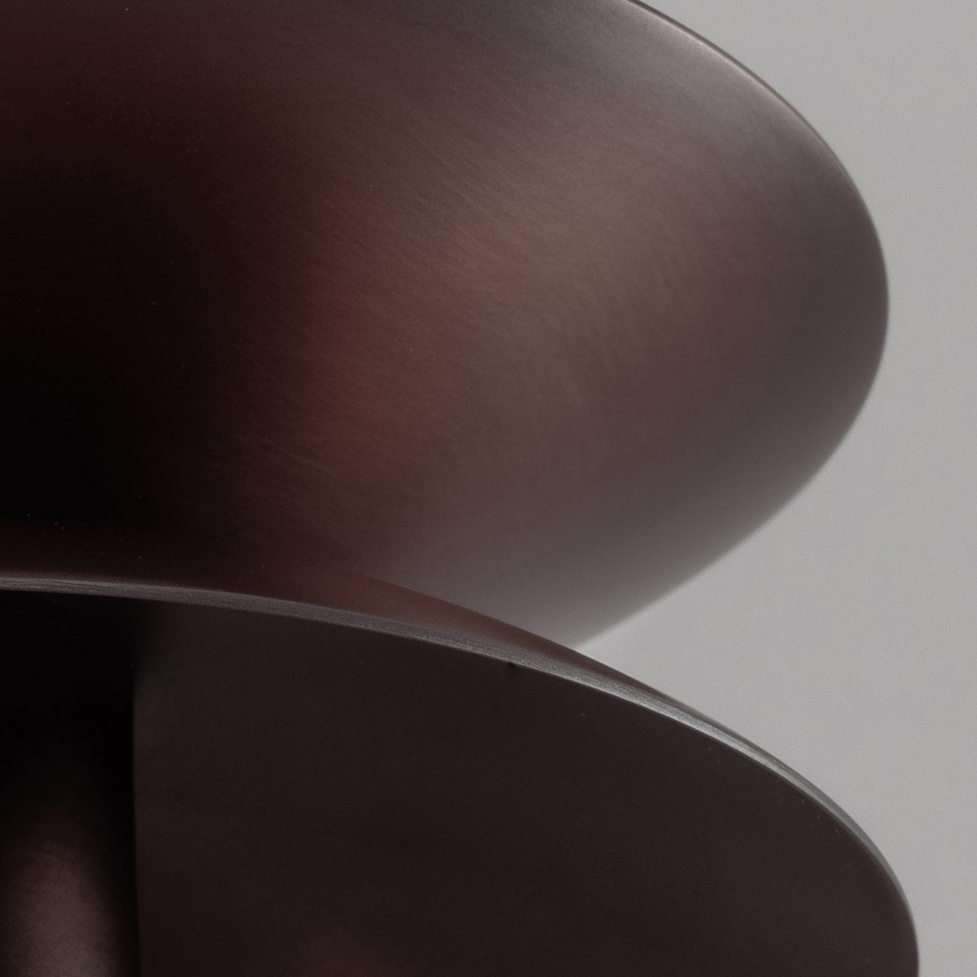 Close-up detail of the Babylon 6 chandelier, handcrafted by Schwung in brass and marble with a Classic Bronze finish.