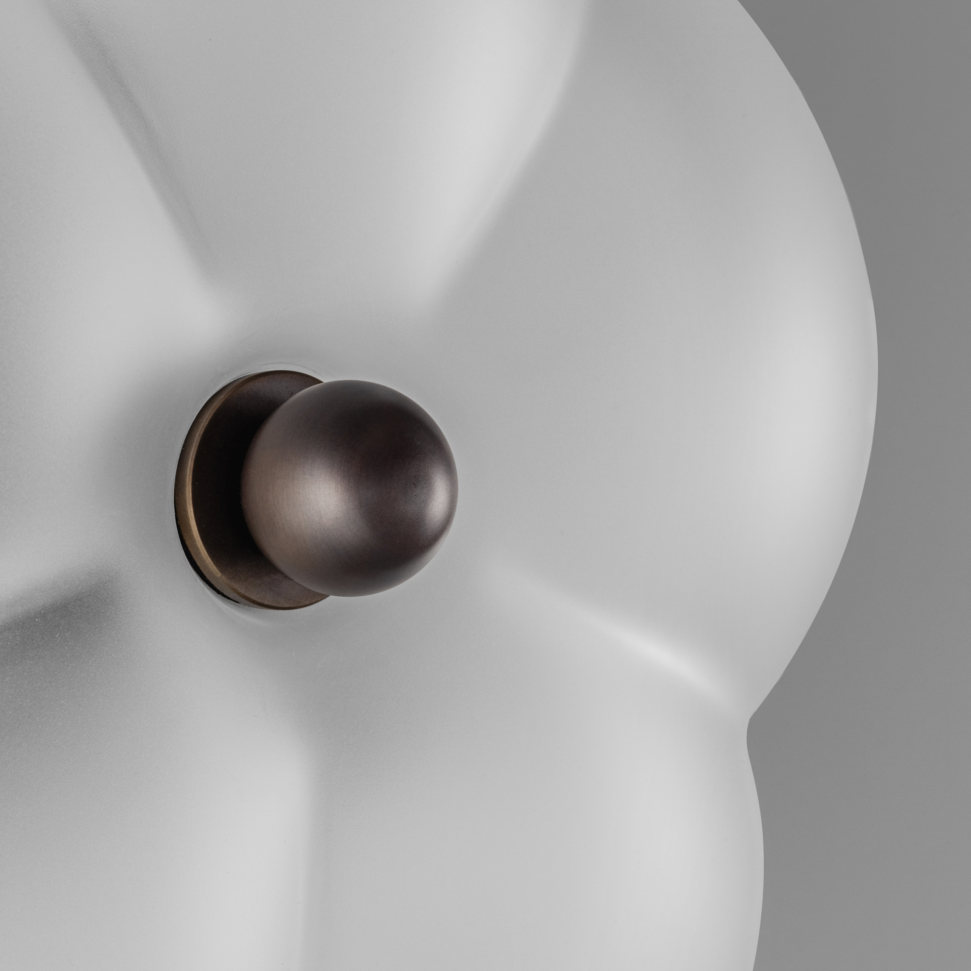 Close-up of mouth-blown glass showcasing the handcrafted lighting detail by Schwung.