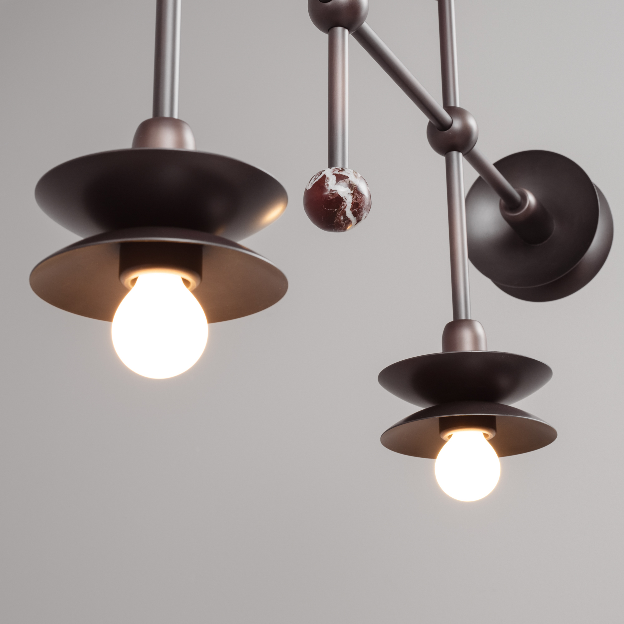 Babylon Linear 7 brass and marble Chandelier in classic bronze  finish handcrafted by Schwung