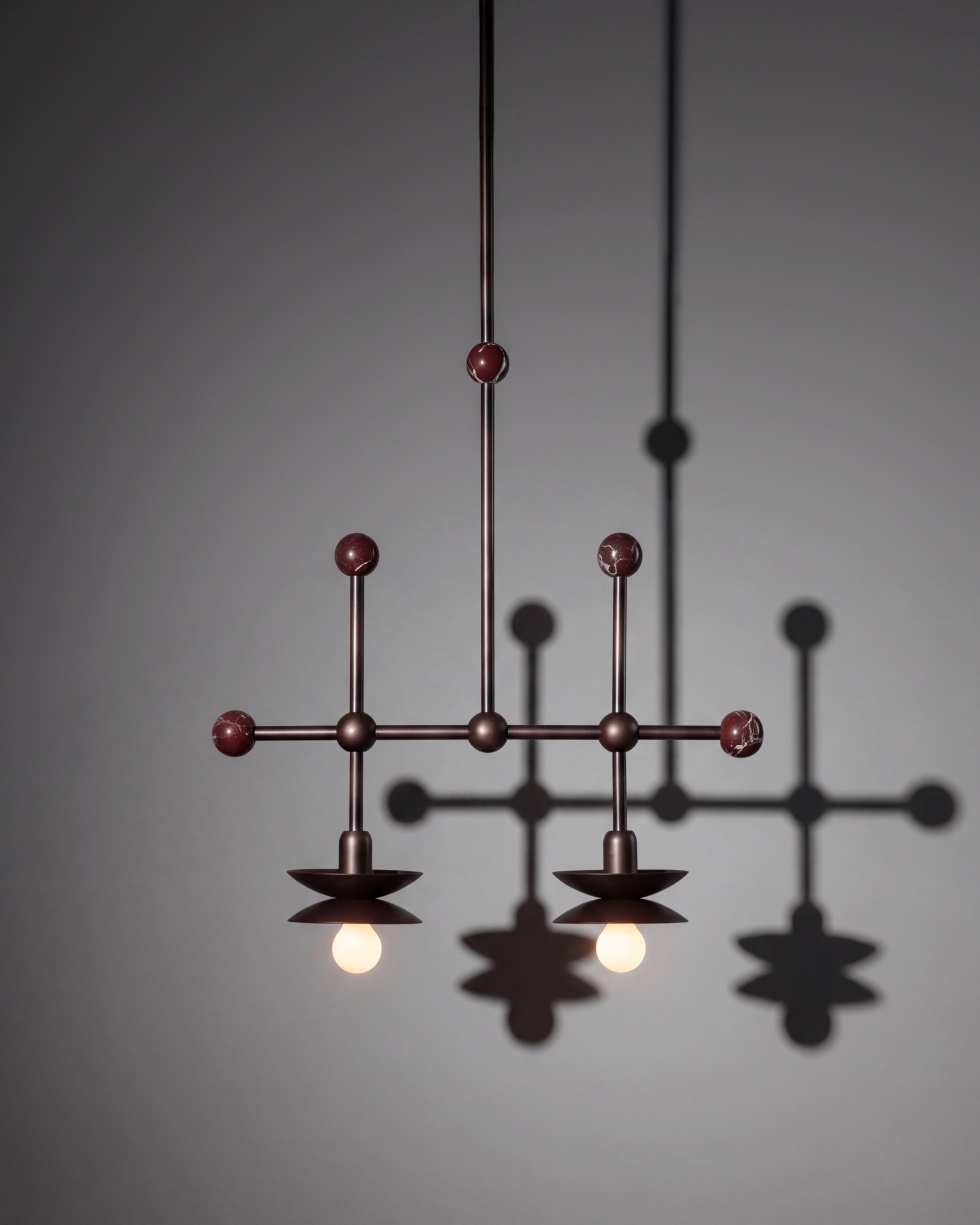 Babylon Double brass and marble pendant in classic bronze  finish handcrafted by Schwung