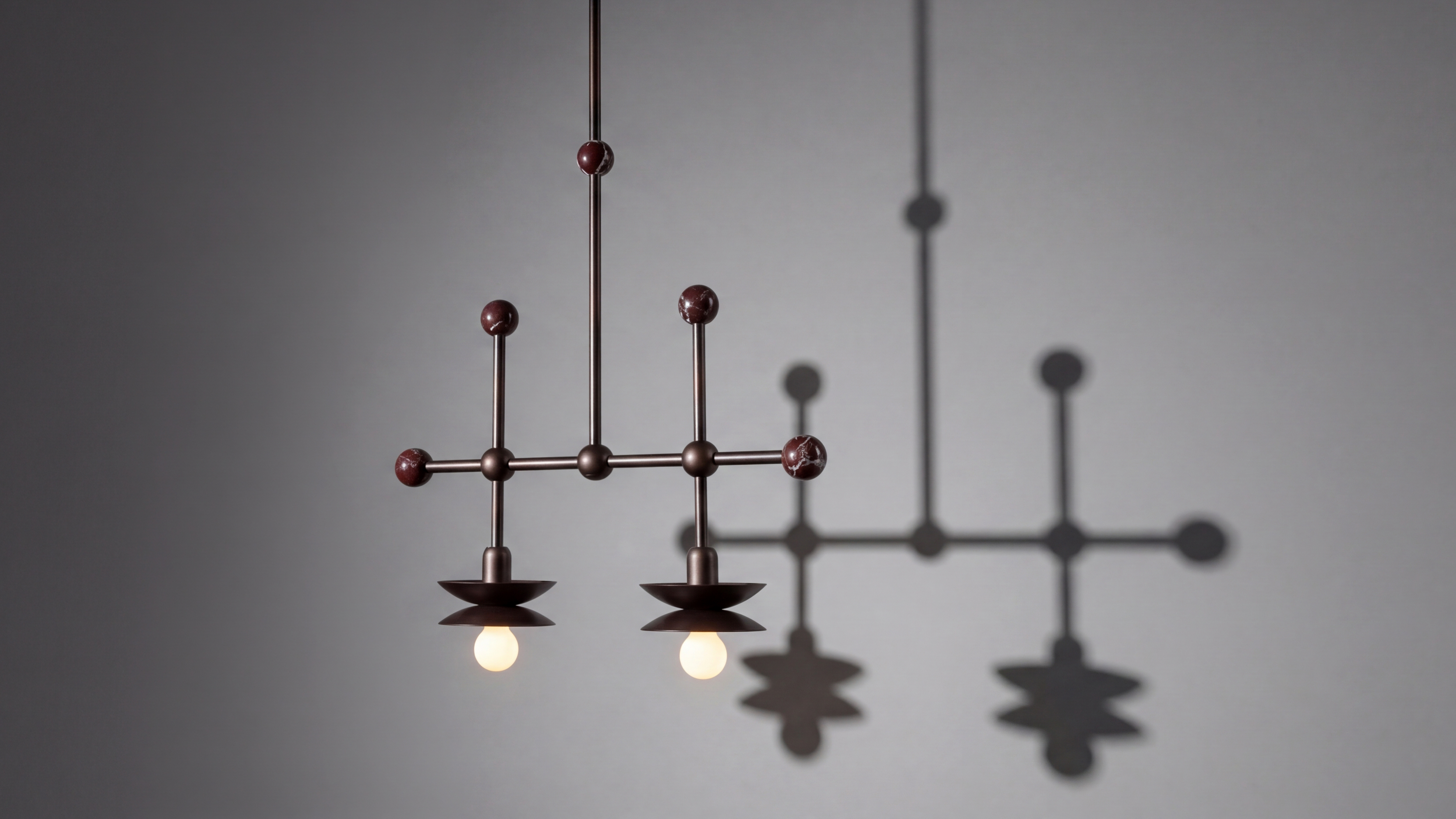 Babylon Double brass and marble pendant in classic bronze  finish handcrafted by Schwung