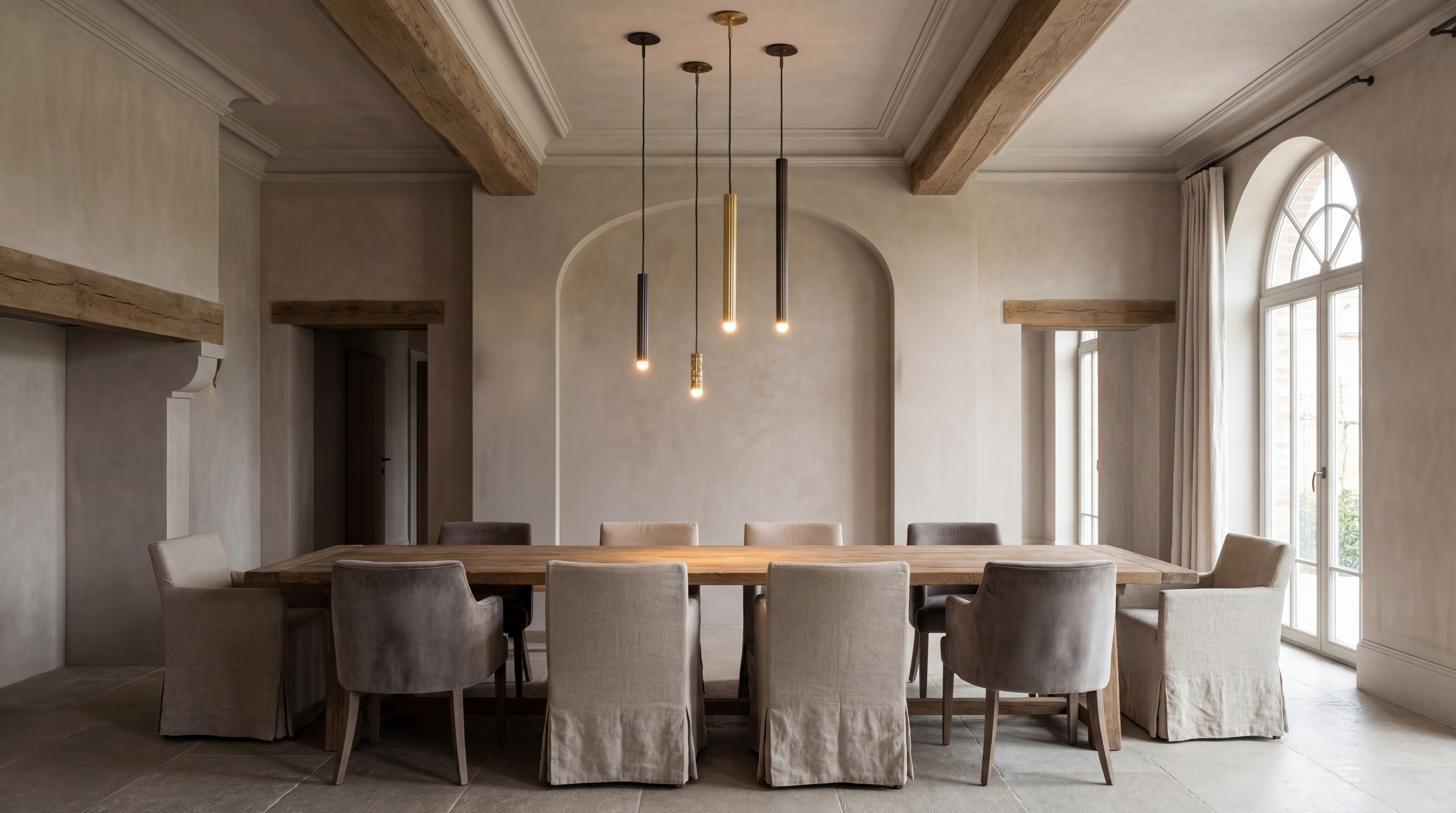 Vesta pendants in SM, MD, LG and XLG sizes, suspended above an elegant dining table in a refined neutral interior by Schwung.