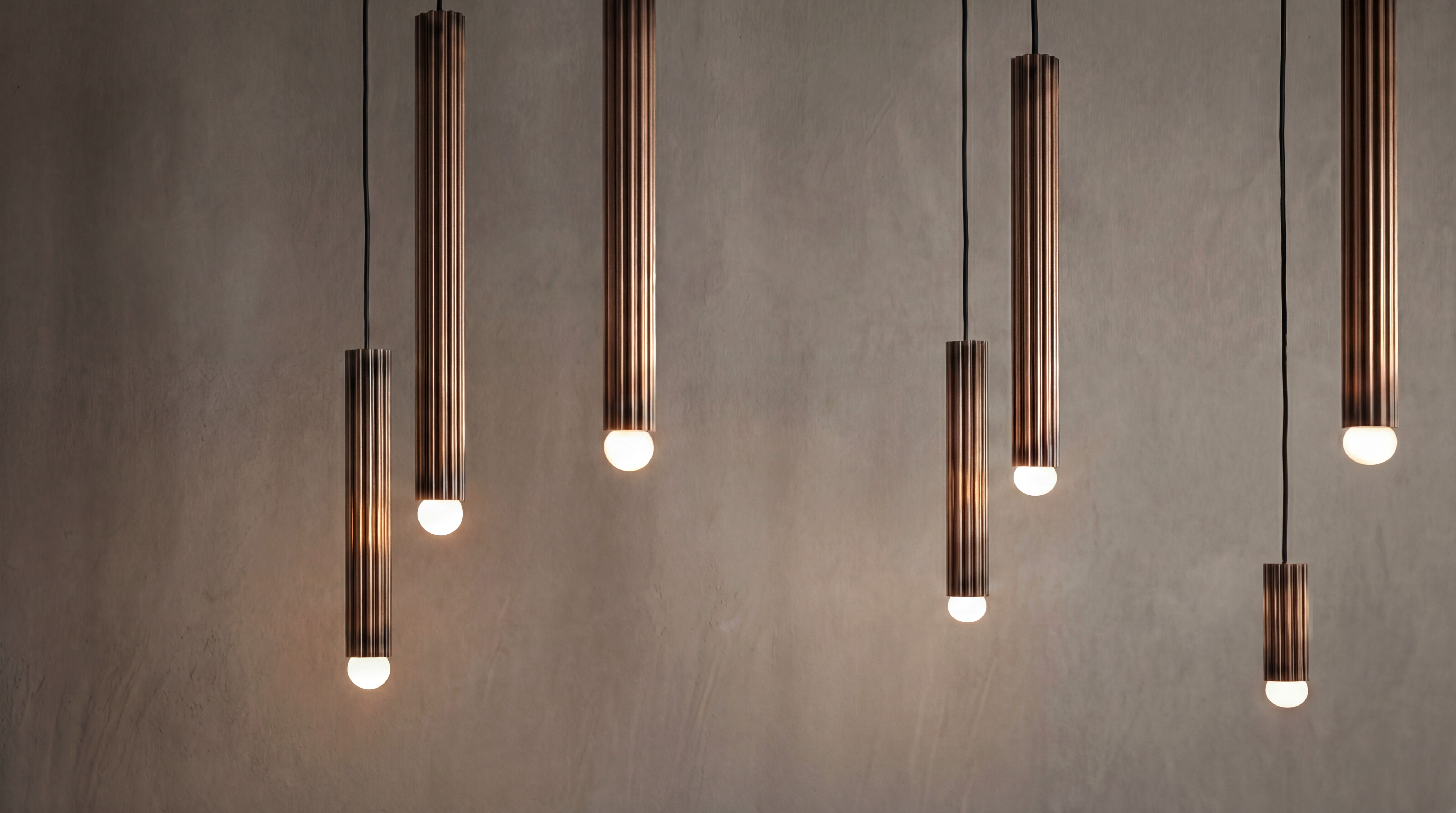 Vesta Single pendants in various sizes in shadowed gildfinish, handcrafted by Schwung.