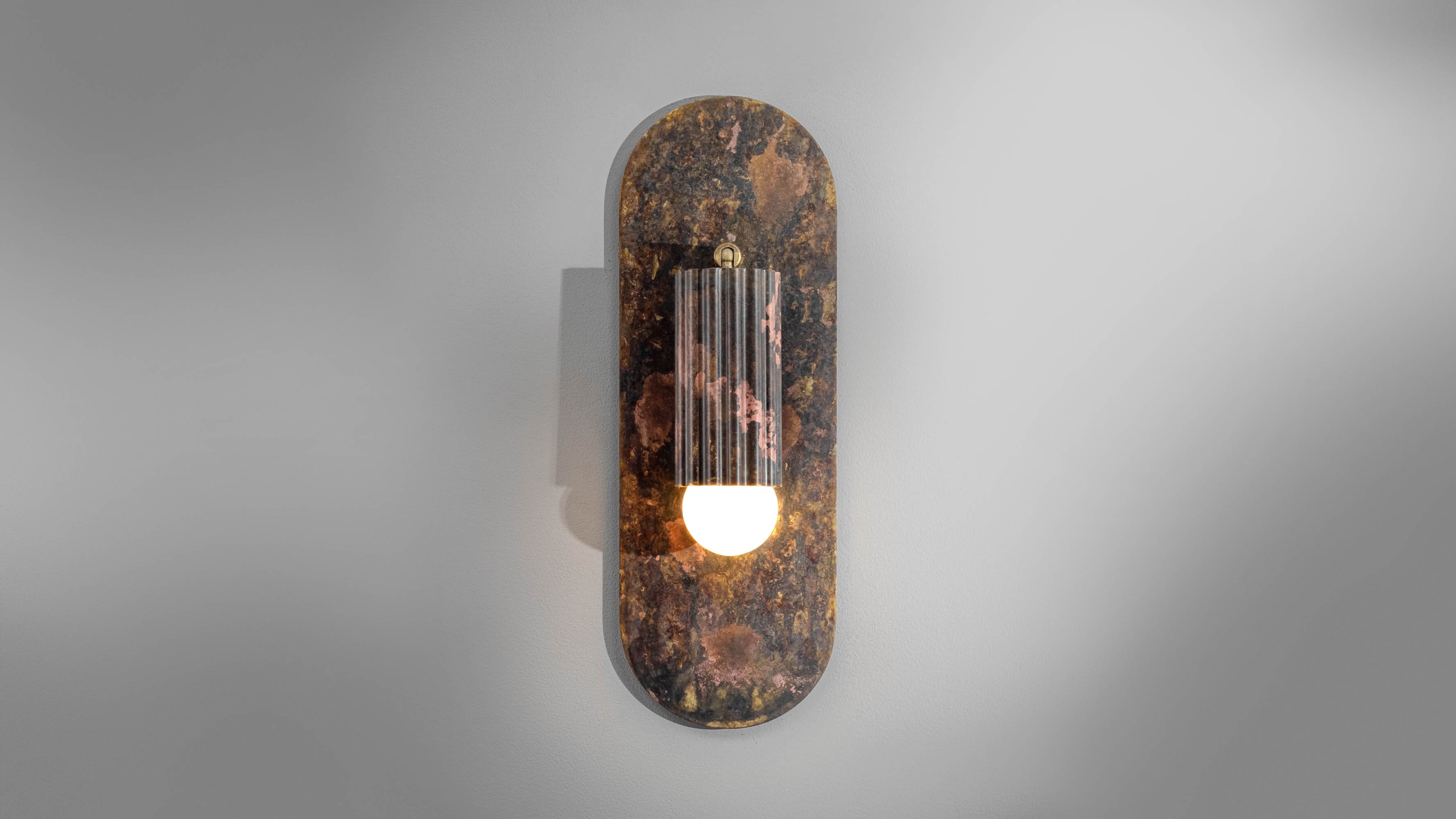 Vesta Flex brass Wall Sconce in rose ash finish handcrafted by Schwung