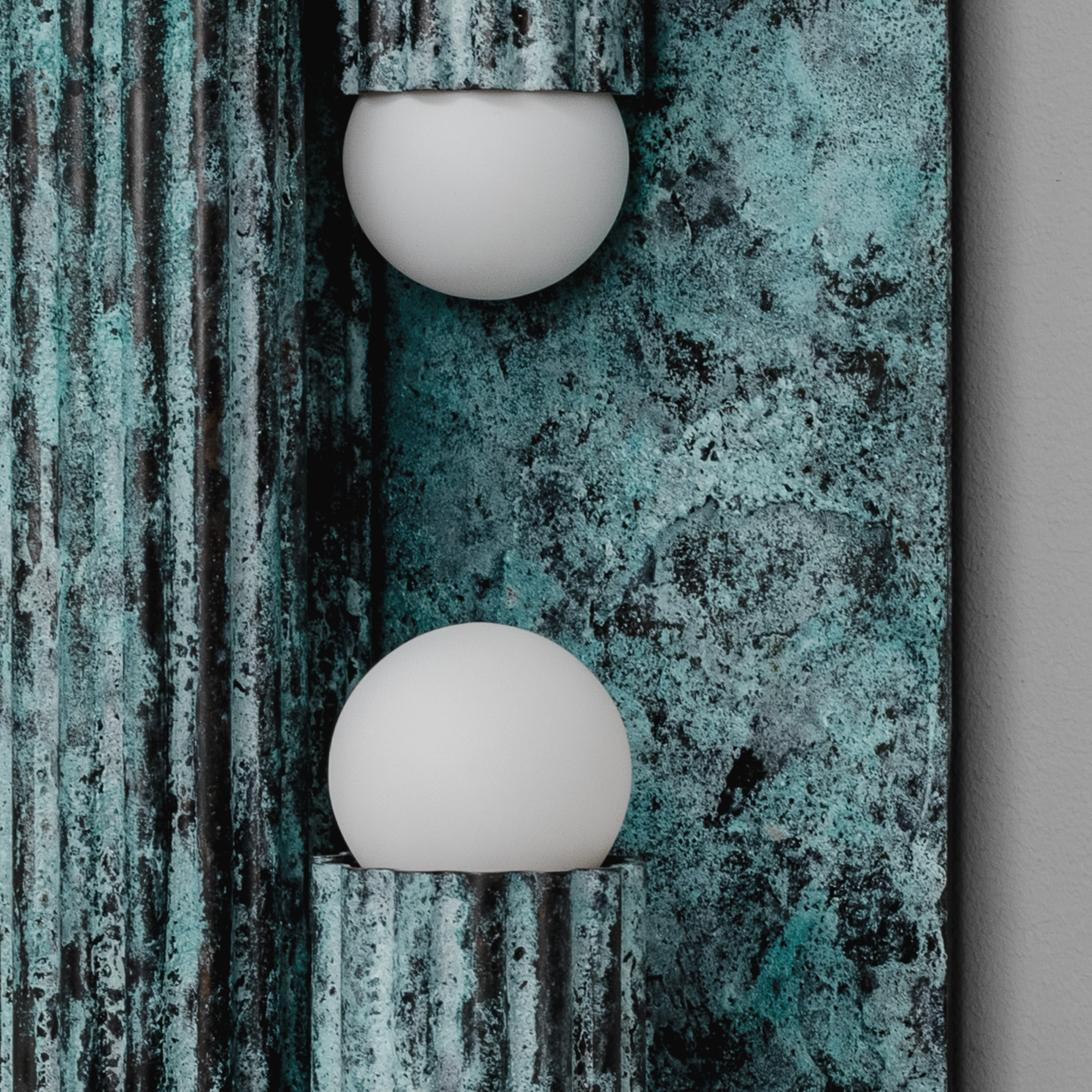 Close-up of brass elements in Vesta Legion LG showcasing the lighting detail by Schwung.