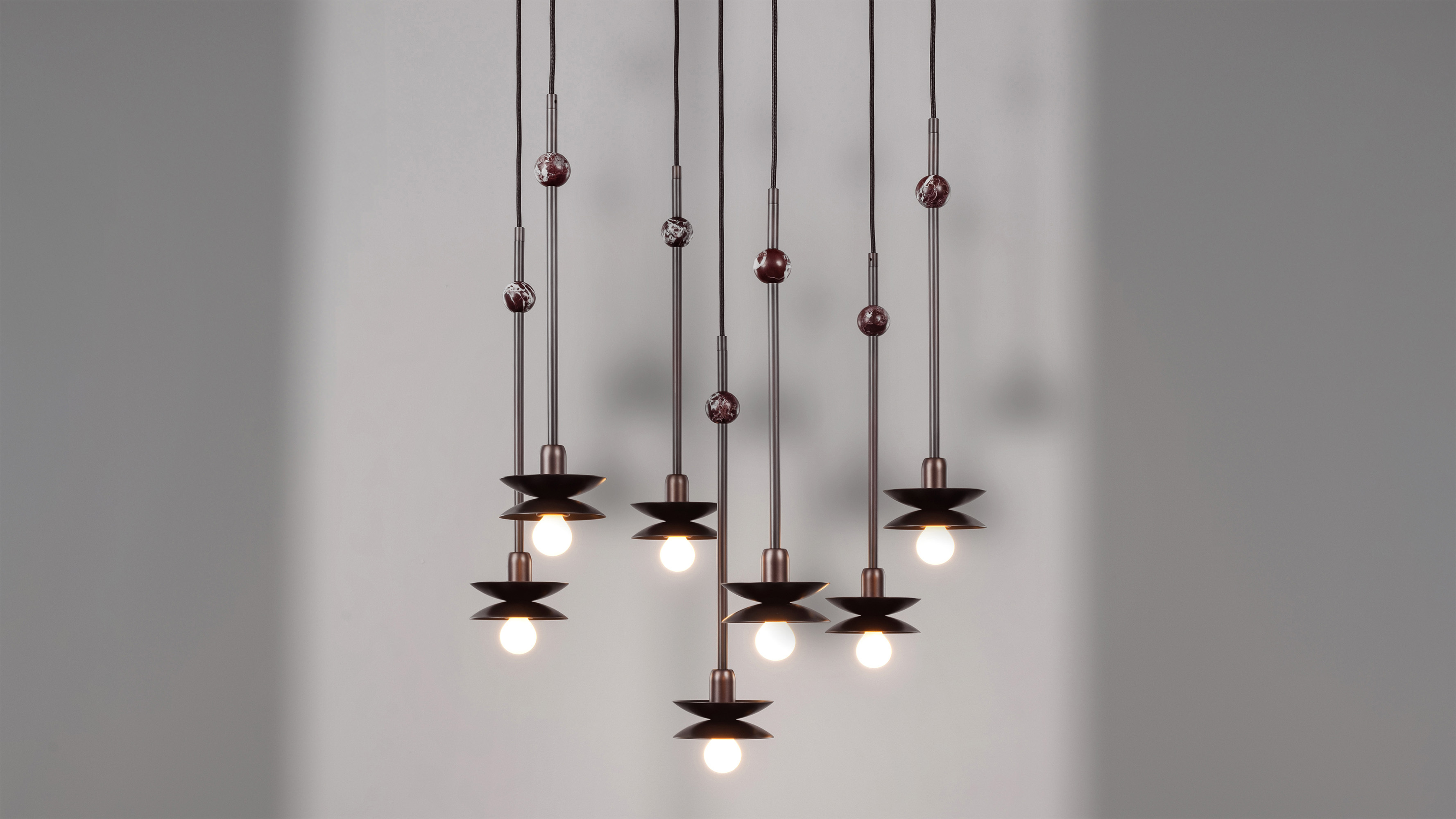 Babylon Cluster 7 brass and marble chandelier in classic bronze finish handcrafted by Schwung
