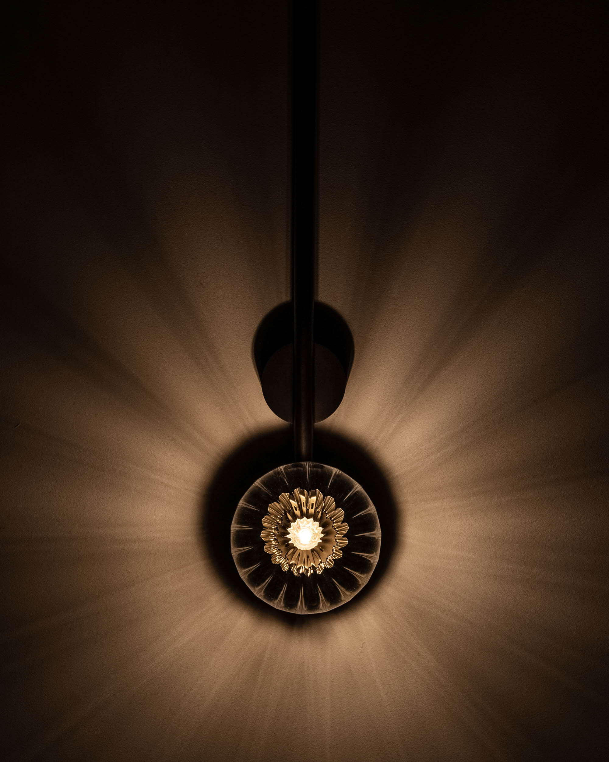 Tubular LG brass and glass Wall Sconce in classic bronze finish with ribbed glass handcrafted by Schwung