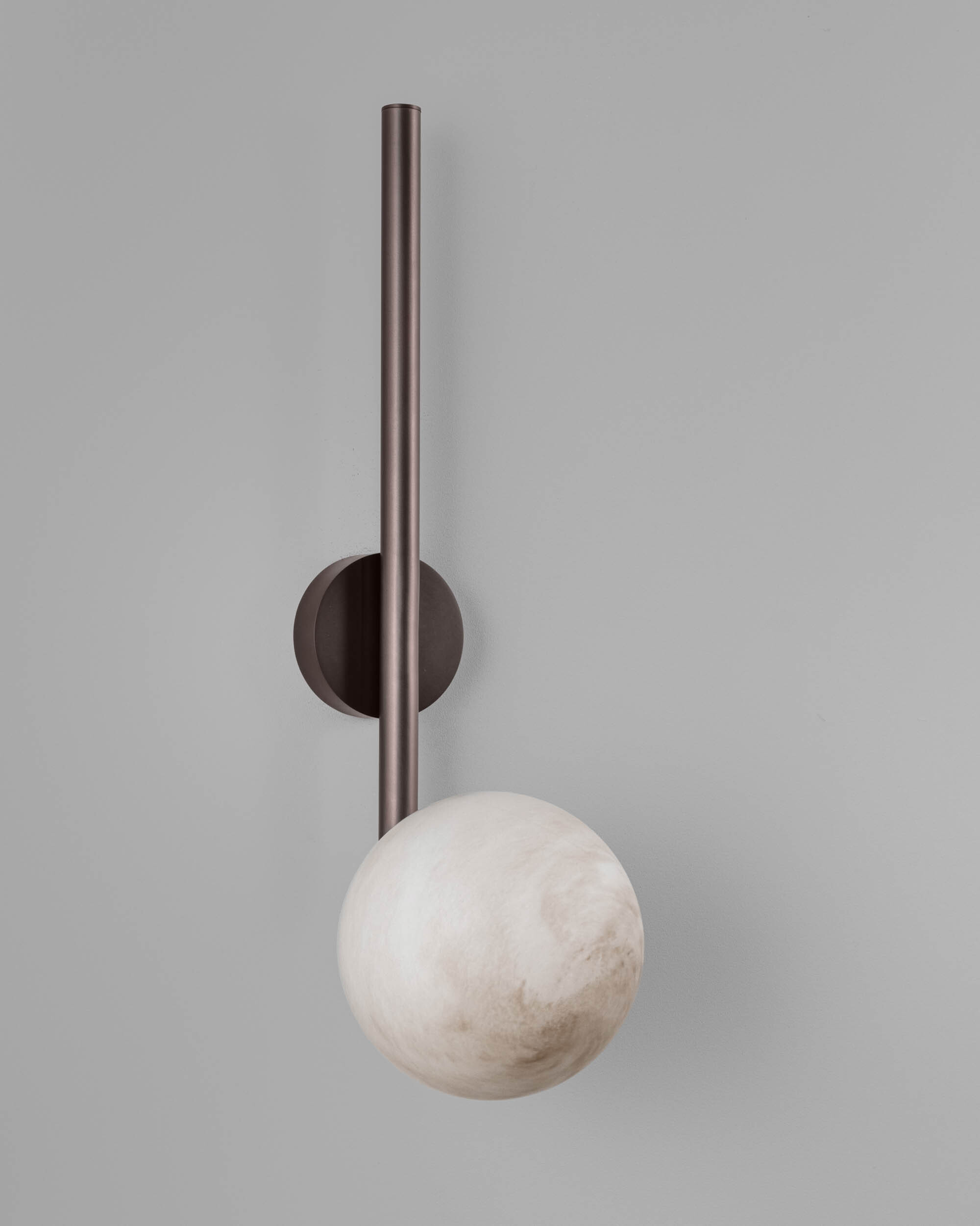 Tubular LG brass and glass Wall Sconce in classic bronze finish with marble globe handcrafted by Schwung