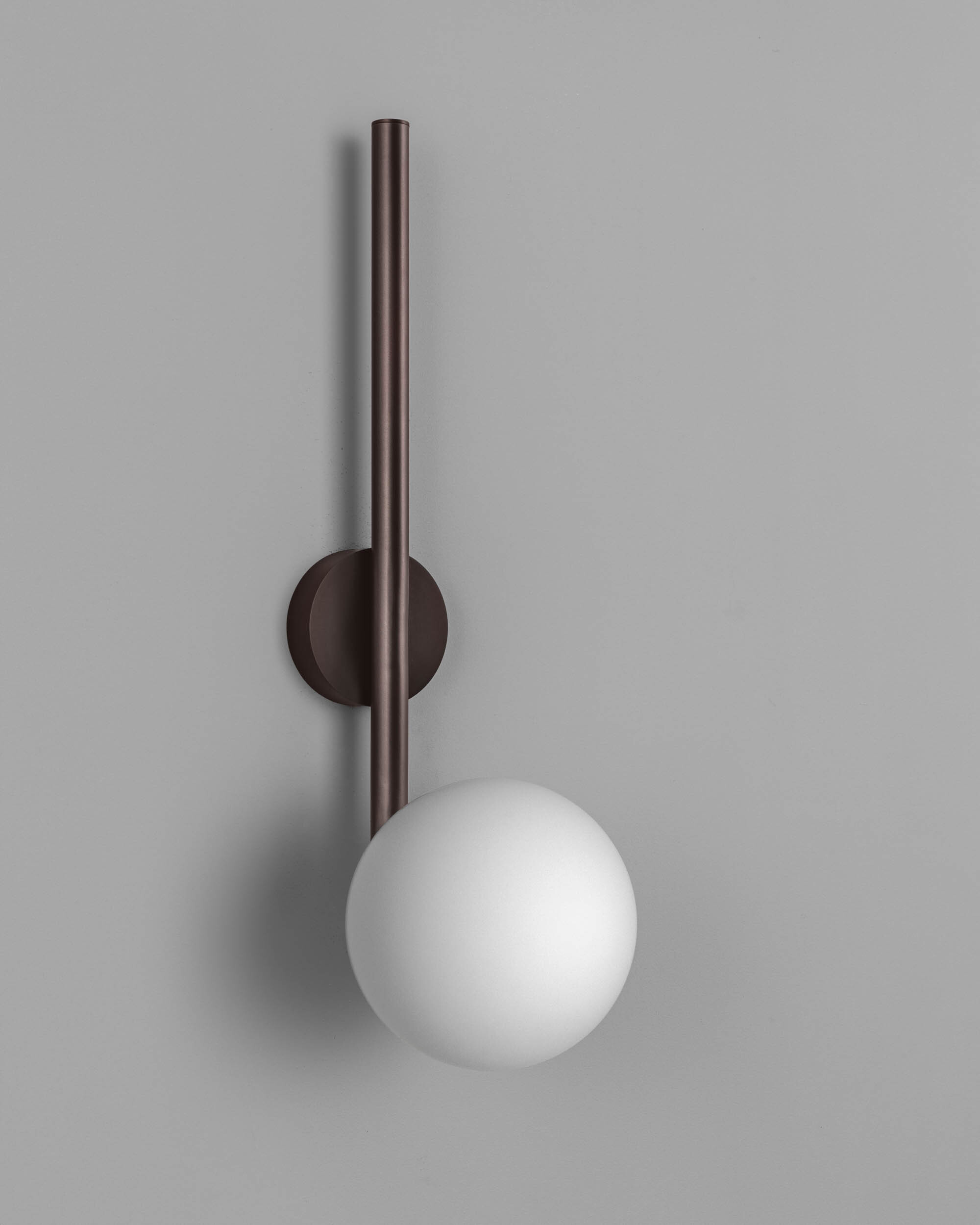 Tubular LG brass and glass Wall Sconce in classic bronze finish handcrafted by Schwung