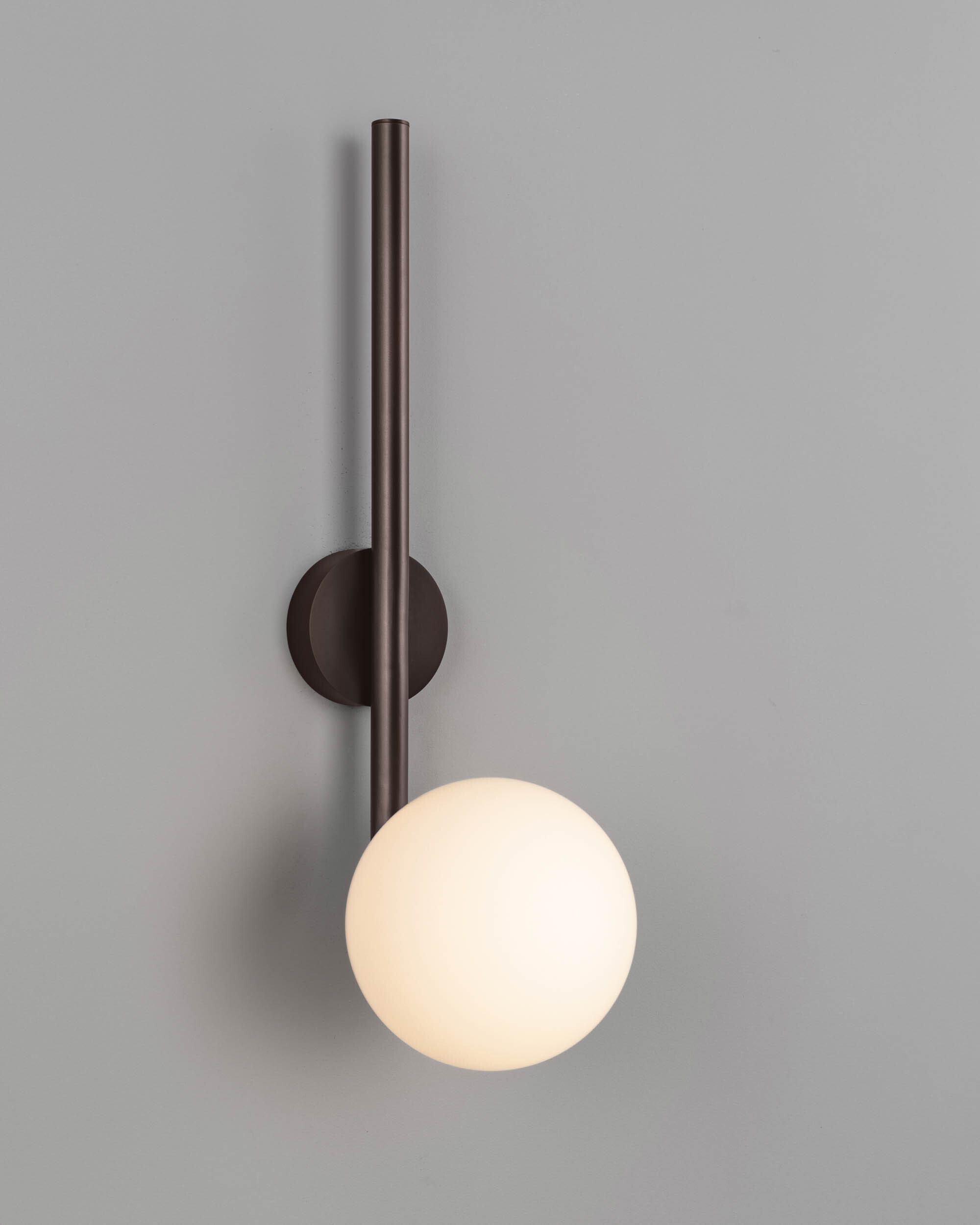 Tubular LG brass and glass Wall Sconce in classic bronze finish handcrafted by Schwung
