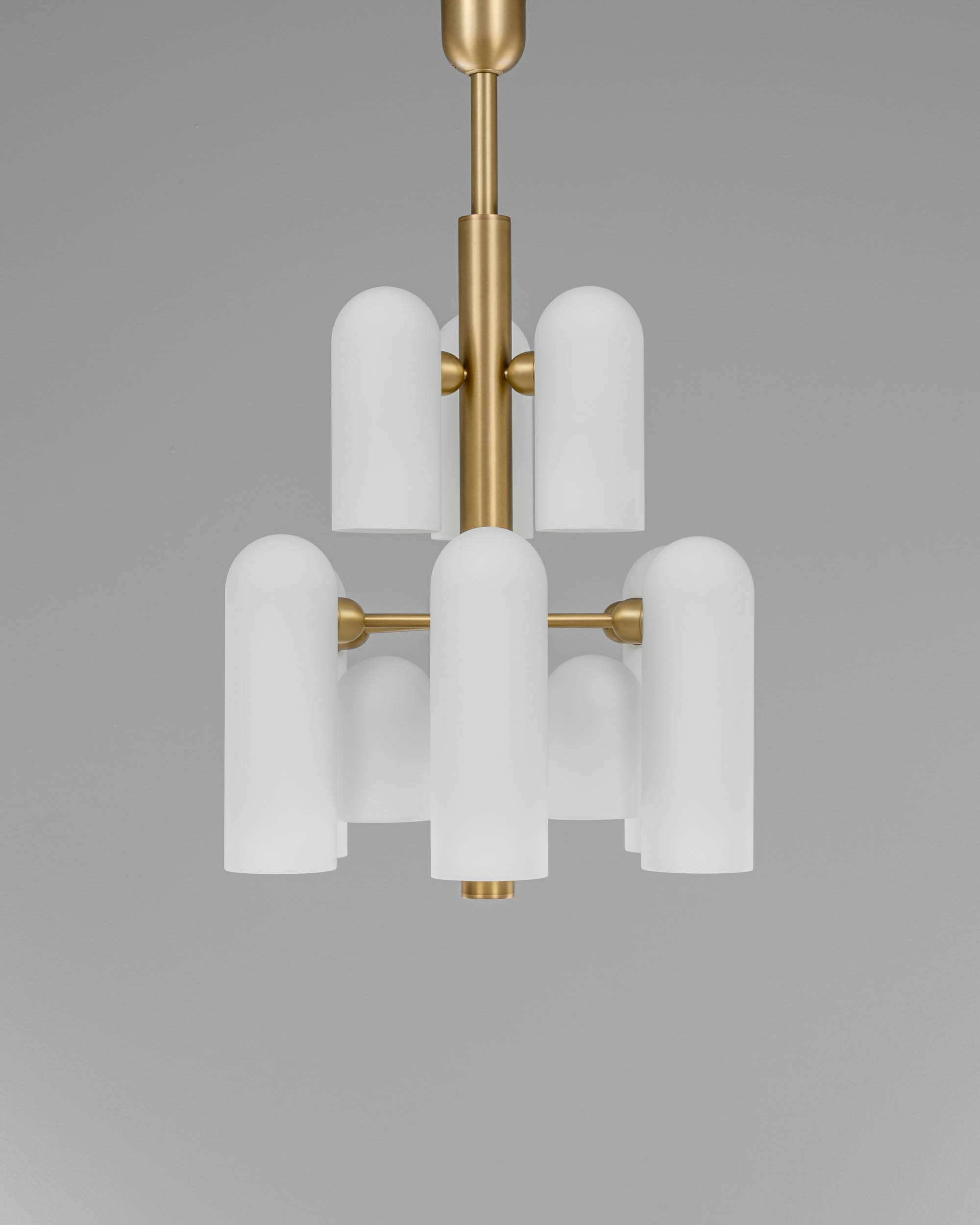 Odyssey 12 brass and glass Chandelier in lacqured burnished brass finish handcrafted by Schwung