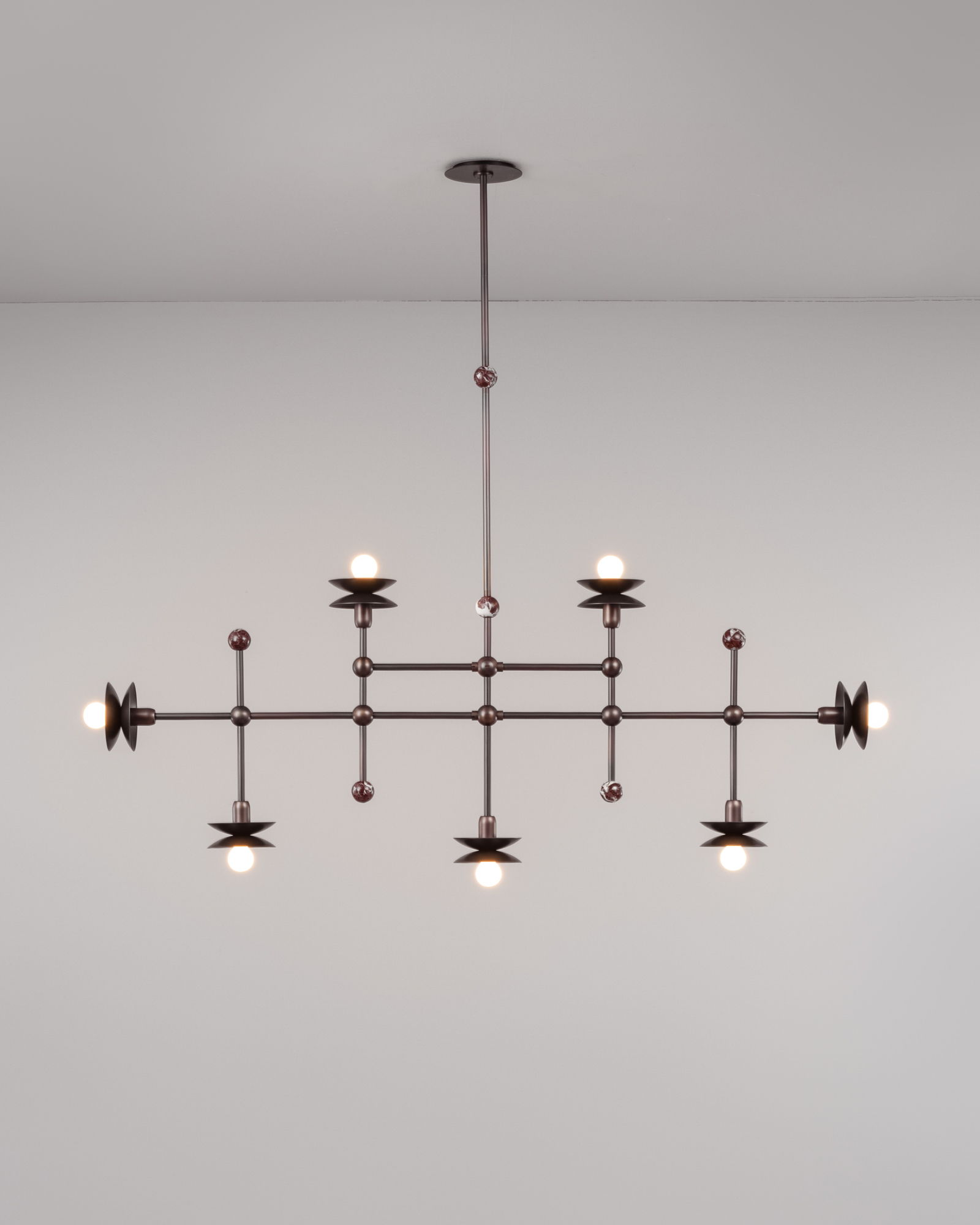 Babylon Linear 7 brass and marble Chandelier in classic bronze  finish handcrafted by Schwung