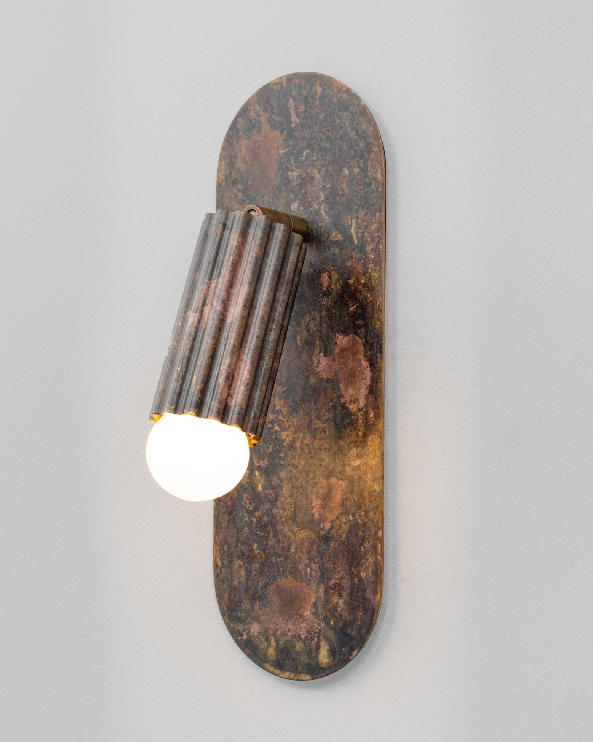 Vesta Flex brass Wall Sconce in rose ash finish handcrafted by Schwung