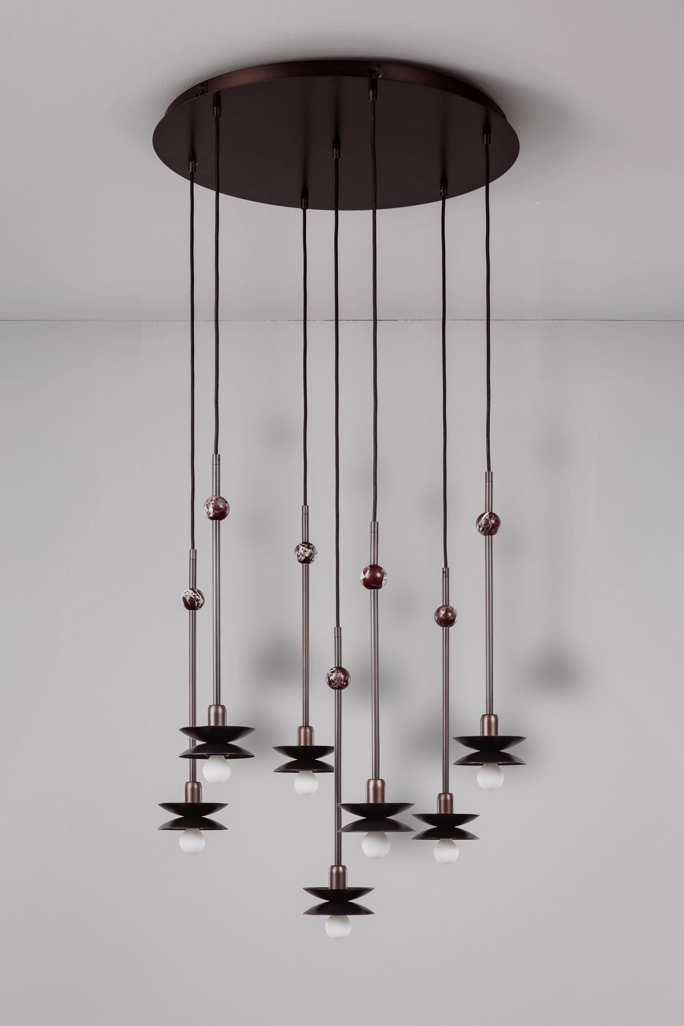 Babylon Cluster 7 brass and marble chandelier in classic bronze finish handcrafted by Schwung